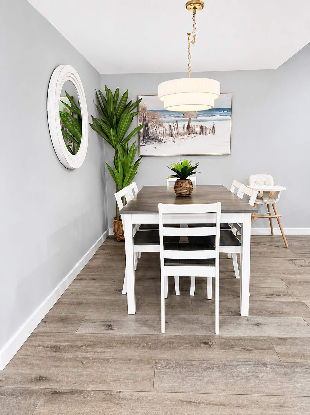Dining nook with white table and chairs