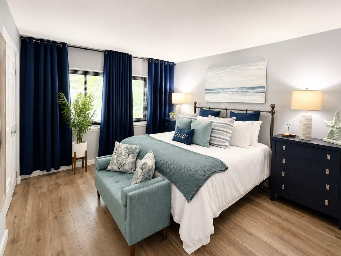King bedroom with seating chair and nightstands